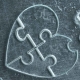 Puzzle made of glass by water jet cutting